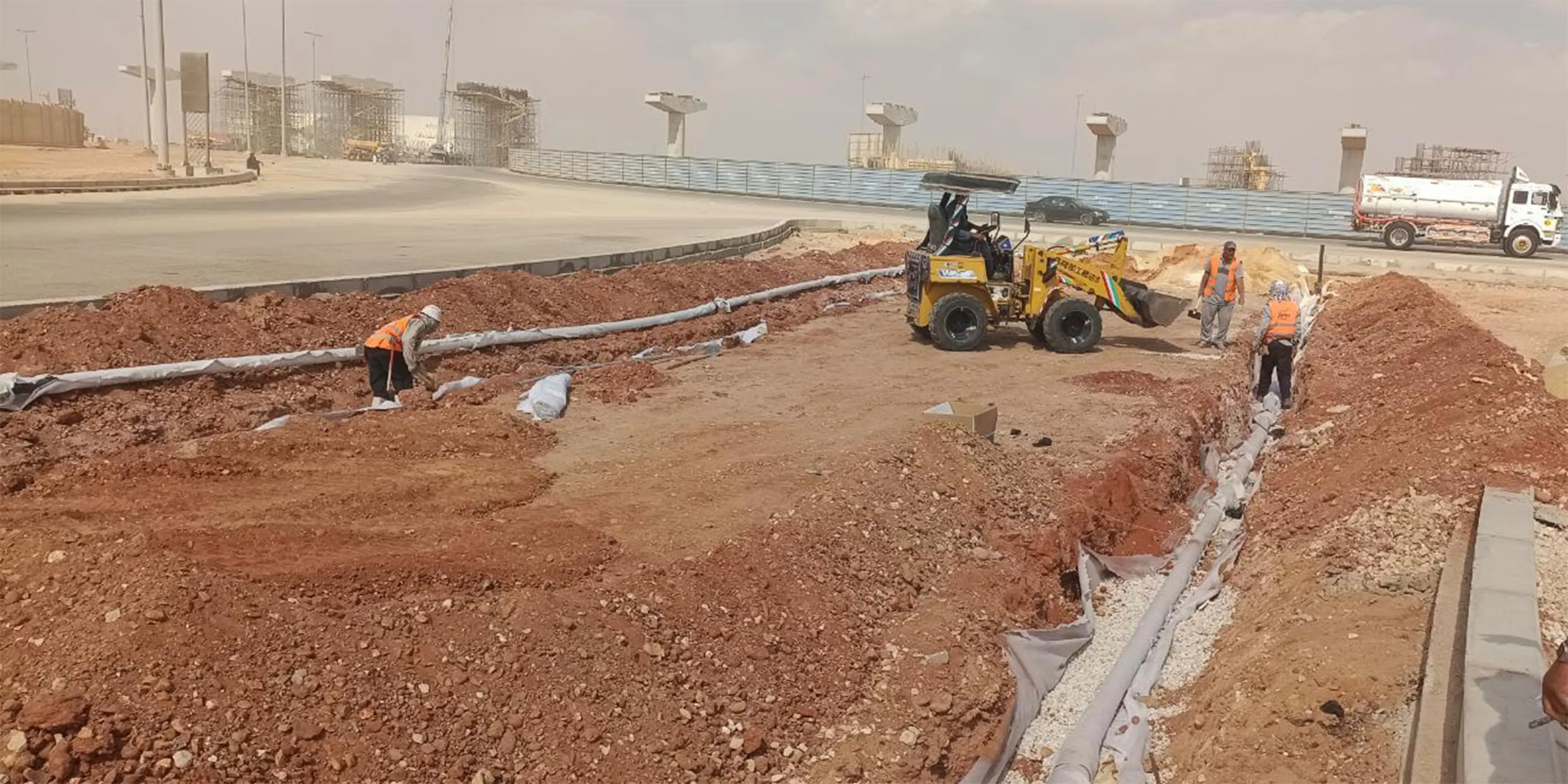 أعمال تنسيق الموقع العام لإمتداد محور بن زايد